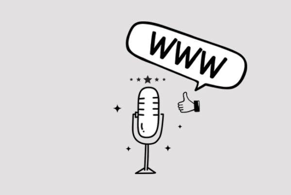 image of a microphone with a speech bubble www. in on grey background